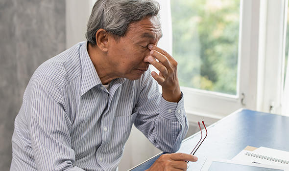 Freepik_asian-elderly-stress-tired-and-holding-his-nose-suffer-sinus-pain-fatigue-from-hard-work_coffeekai.jpg