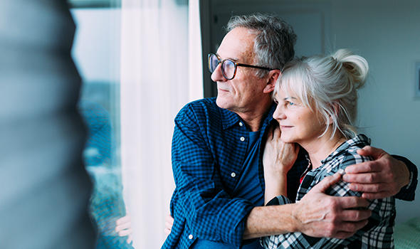 Freepik_elderly-couple-in-retirement-home-looking-out-of-window_freepik.jpg